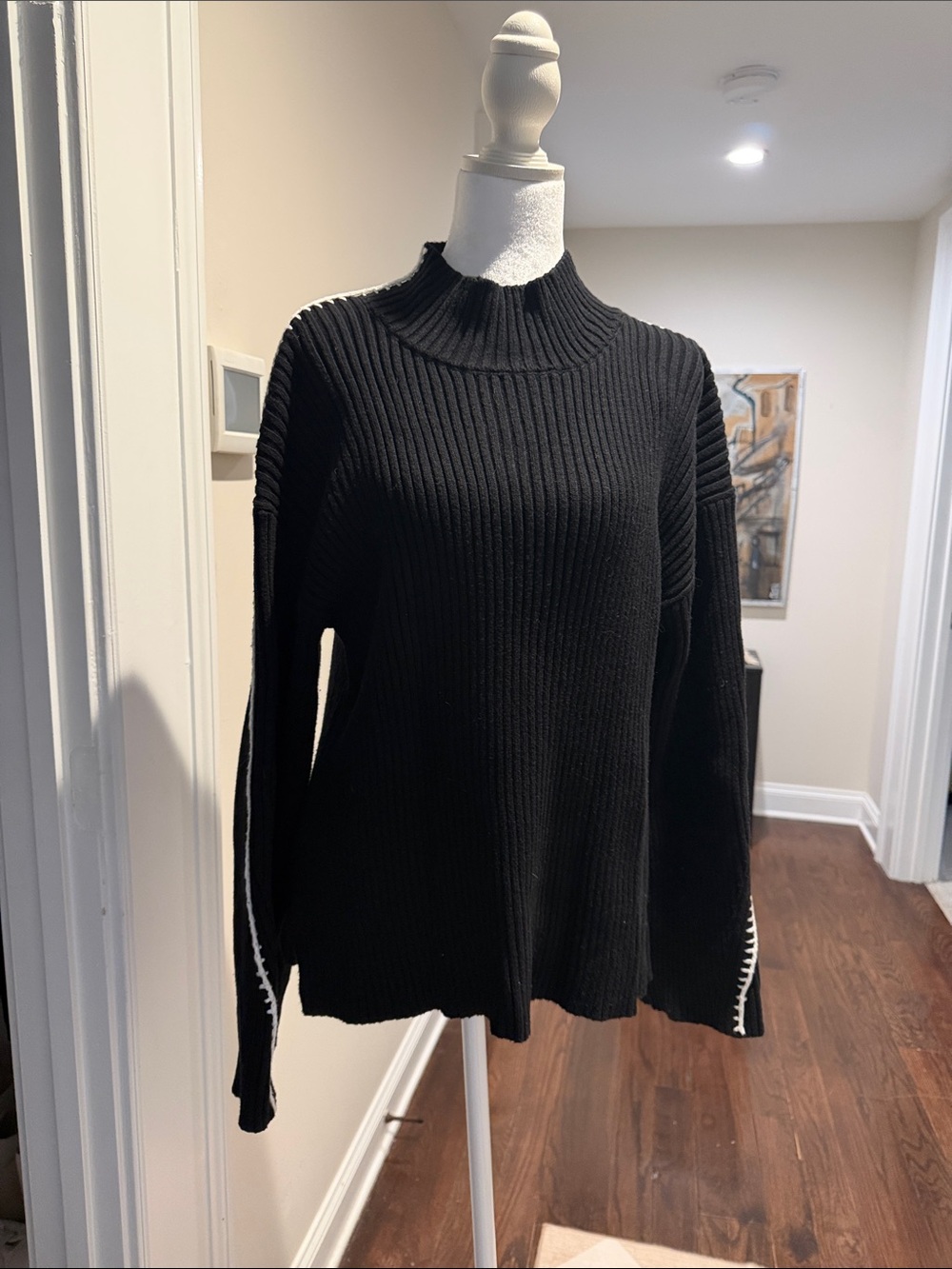 Black Ribbed Turtleneck Sweater with White Trim